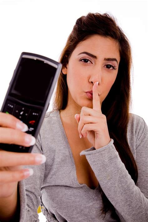 Woman with Cell Phone Instructing To Be Silent Stock Photo - Image of ...