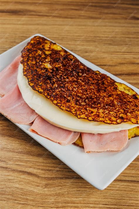 Premium Photo | Ham and cheese cachapa Venezuelan gastronomy stitched