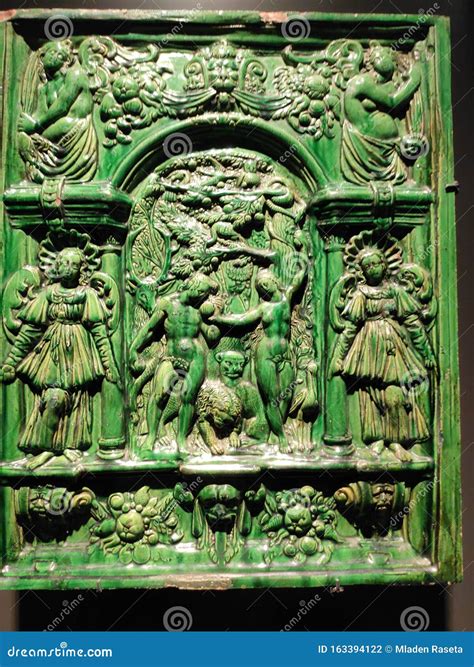 Clay Tile Adam and Eve Representation with Angels Haven on Earth Stock