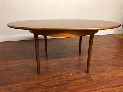 SOLD - Round Teak Vintage Butterfly Leaf Dining Table - Modern to Vintage