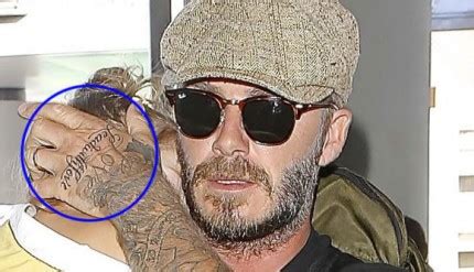 David Beckham Flashes New “Lead With Love” Hand Tattoo - Beckham Tattoos