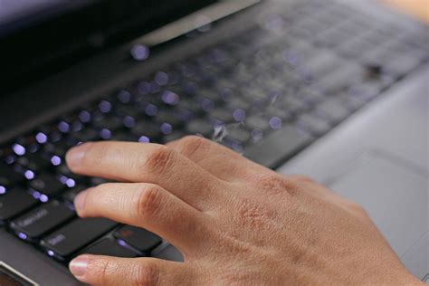 Top View Photo of Person working on Laptop and Smartphone next to ...