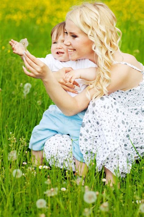 Young mother and her child stock image. Image of offspring - 119502555