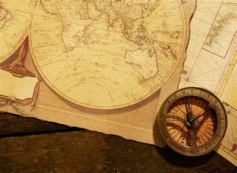 Compass On Old Map Stock Photo - Download Image Now - Adventure, Antique, Cartography - iStock