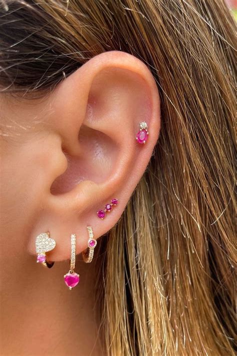 Pink ear piercings | Ear piercings colorful, Stacked piercings huggie