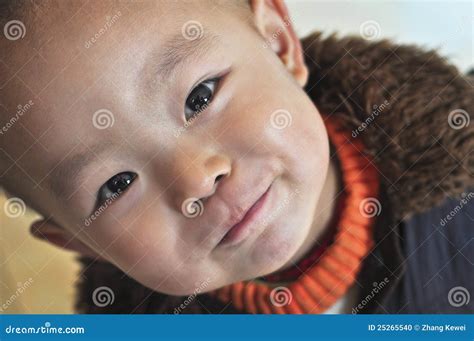A boy look at you stock photo. Image of china, child - 25265540