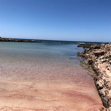 pink beach crete greece  beaches
