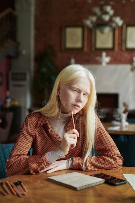 Creative Albino Girl with Long White Hair Thinking of Idea while Sketching Stock Photo - Image ...