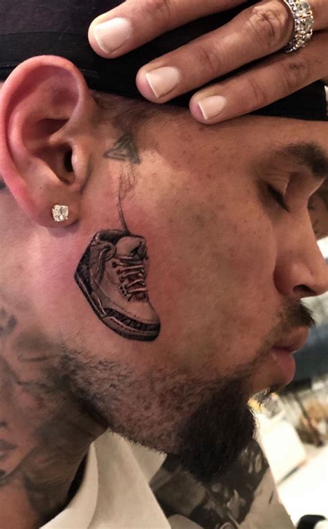 Chris Brown Debuts Massive Face Tattoo - E! Online - AP