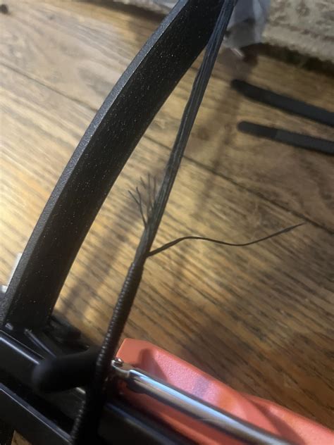Best course of action removing this damaged crossbow string? : r/Archery