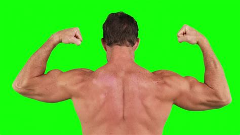 premium stock video muscular man flexing  muscles