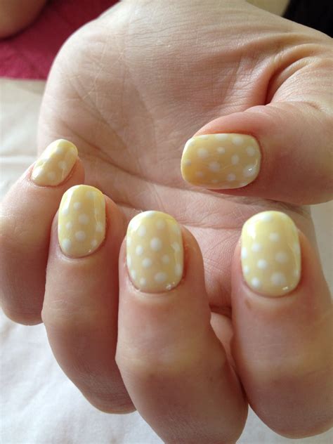 Yellow and white polka dots in 2025 | Dots nails, Polka dot nails