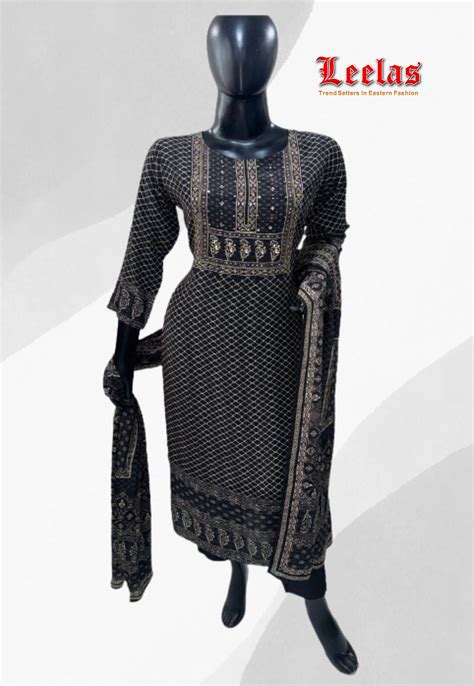 Silk black and gold printed salwar kameez with sequins and stonework o