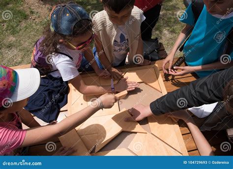 Children Play a Traditional Turkish Wooden Puzzle Game. Editorial Stock ...