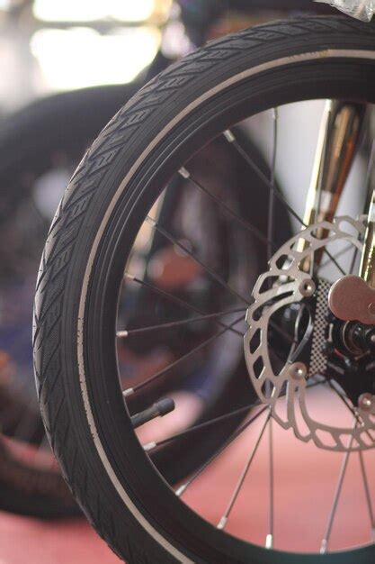 premium photo front wheel  bike cycle