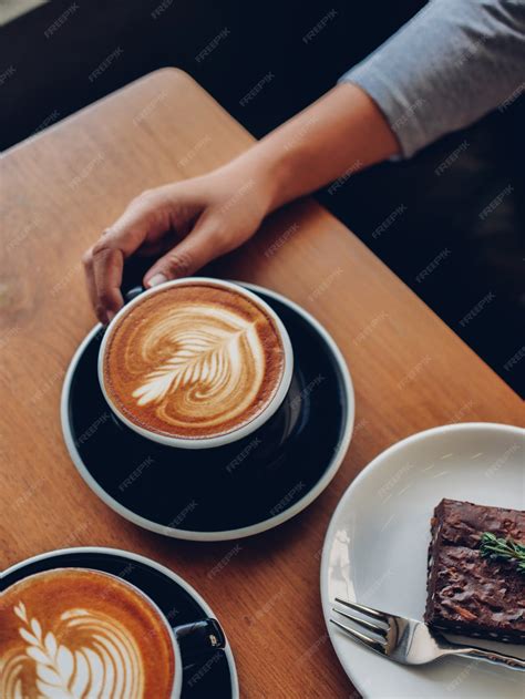 Premium Photo | Coffee latte art in cafe
