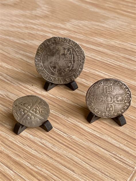 coin display stand  pack history   hands
