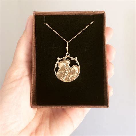 holy family pendant sterling silver peters square
