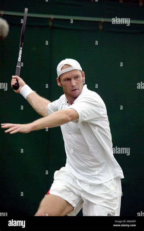 RAINER SCHUETTLER GERMANY WIMBLEDON LONDON ENGLAND 25 June 2003 Stock ...