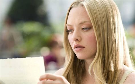 Download Mama Mia! Sophie Reading A Paper Wallpaper | Wallpapers.com