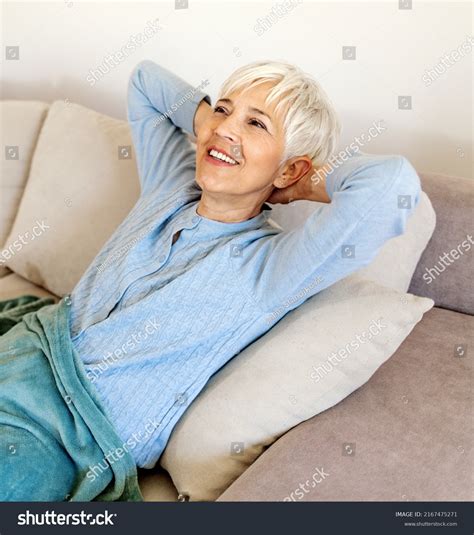 Happy Mature Woman Relaxing Home Reclining Stock Photo 2167475271