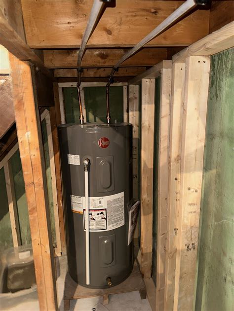 how to change a hot water tank