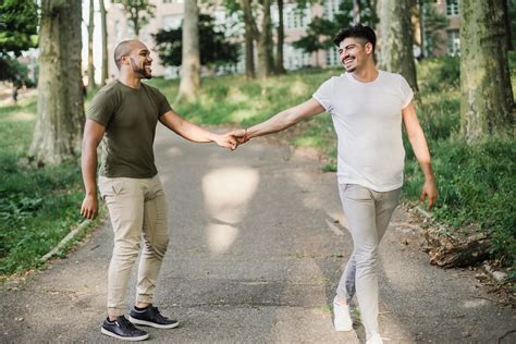 Two Male Friends Holding Hands