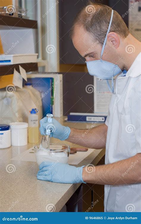 pharmacist mixing medicine stock image image  color