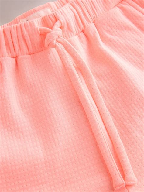 buy fluro pink textured waffle shorts   israel
