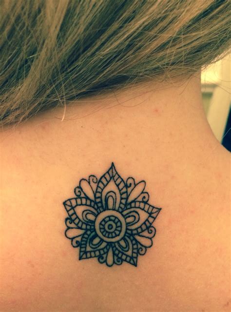flower on neck tattoo 8
