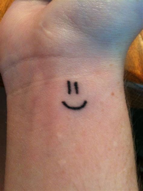 Smiley Face Tattoo