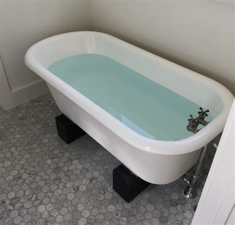 how to install a cast iron tub