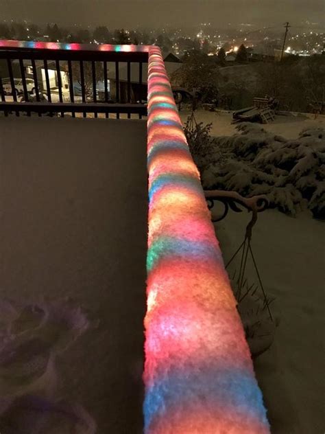 Christmas lights under snow : r/pics