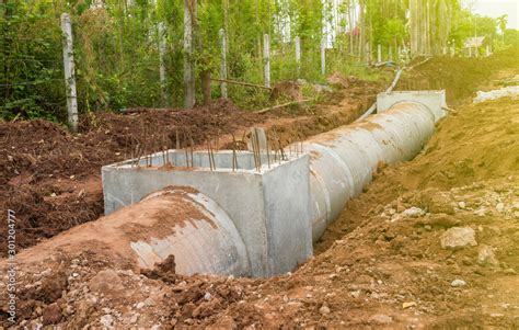 Concrete Drainage Pipe on a Construction Site. Cement tube drainage ...