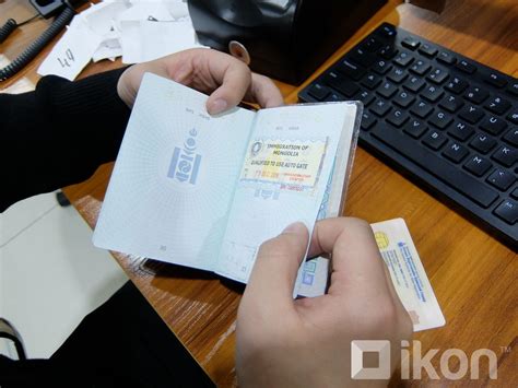 Гадаад паспорт дээрээ заавал наалт наалгах ёстой юу?