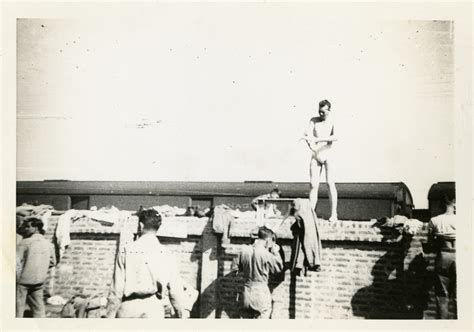 Soldiers shower off prior to boarding a train in India in 1944 | The Digital Collections of the ...