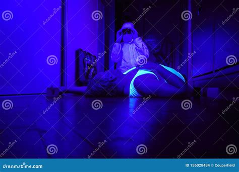 UV Light on Place of Investigation Helping Find More Evidences Stock ...
