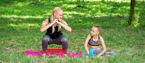 Mother and daughter doing sports exercises 21474721 Stock Photo at Vecteezy