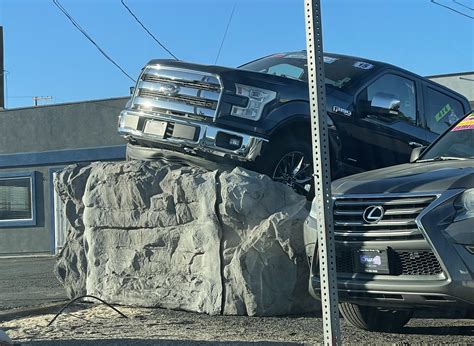 Maybe pick a truck without a ridiculous air dam to park on your fake