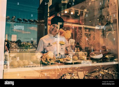 Crafting culinary magic: A chef at work, transforming fresh ingredients ...