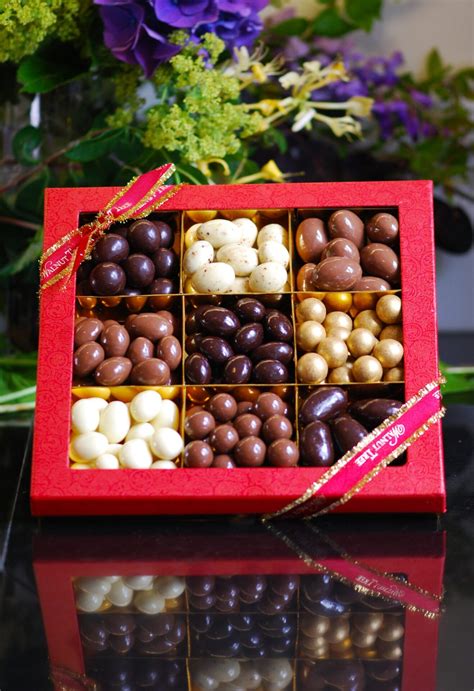 Chocolate covered nut box in milk, dark and white chocolate.