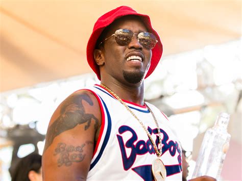 Diddy Swims With Baby Daughter Love In New Photos – Hollywood Life