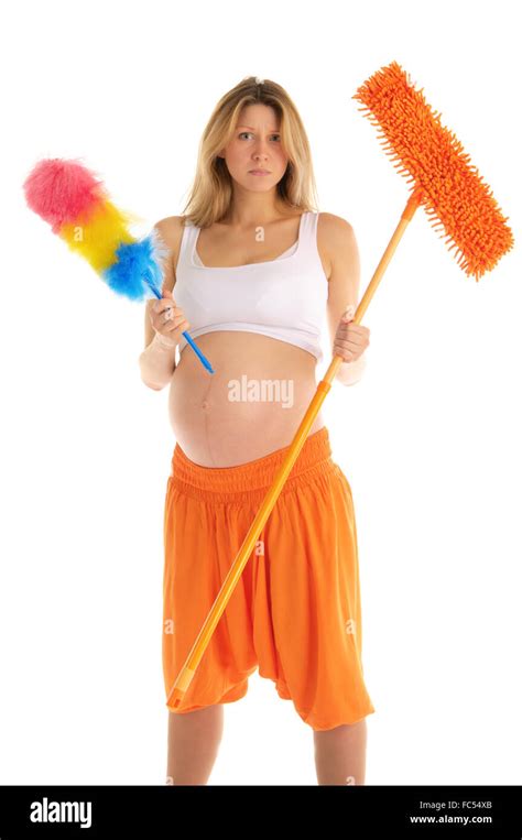 pregnant woman with a mop Stock Photo - Alamy