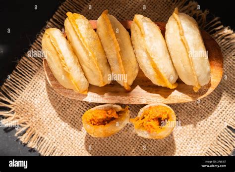 Cireng with chicken filling in a wooden bowl. Cireng is a traditional ...