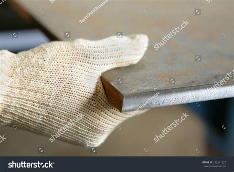 hand holding sheet metal stock photo  shutterstock
