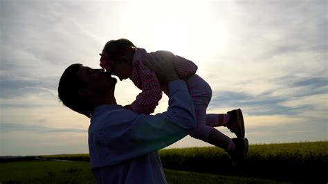 Father Lifting Up His Little Daughter 1623597 Stock Video at Vecteezy