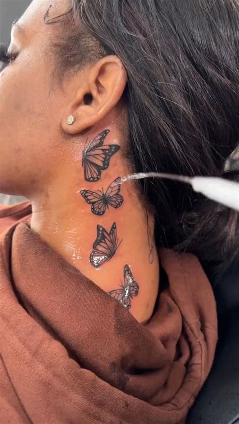 butterfly tattoo  side neck