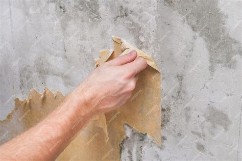 premium photo close   hand holding hands  wall