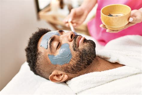 Man Reciving Facial Treatment at Beauty Center Stock Photo - Image of ...