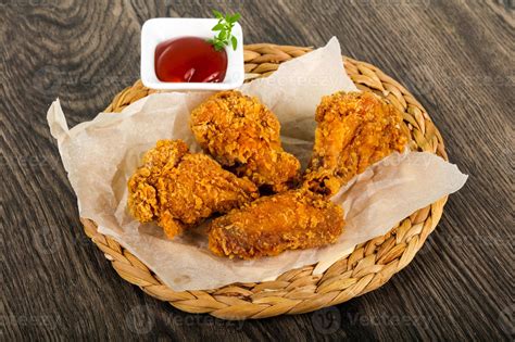 Crispy chicken wings 8433778 Stock Photo at Vecteezy